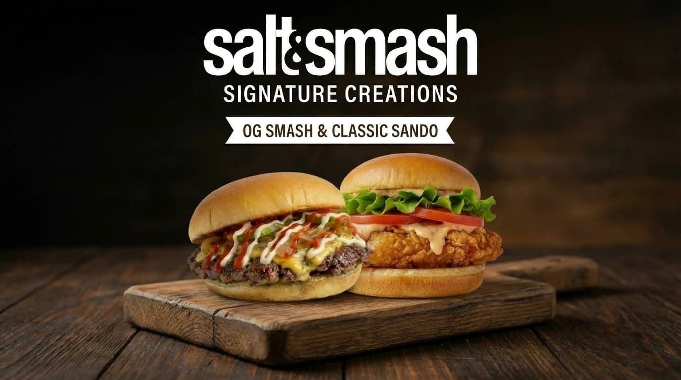 Salt & Smash Signature Creations featuring the OG Smash burger and Classic Sando chicken sandwich on a rustic wooden board